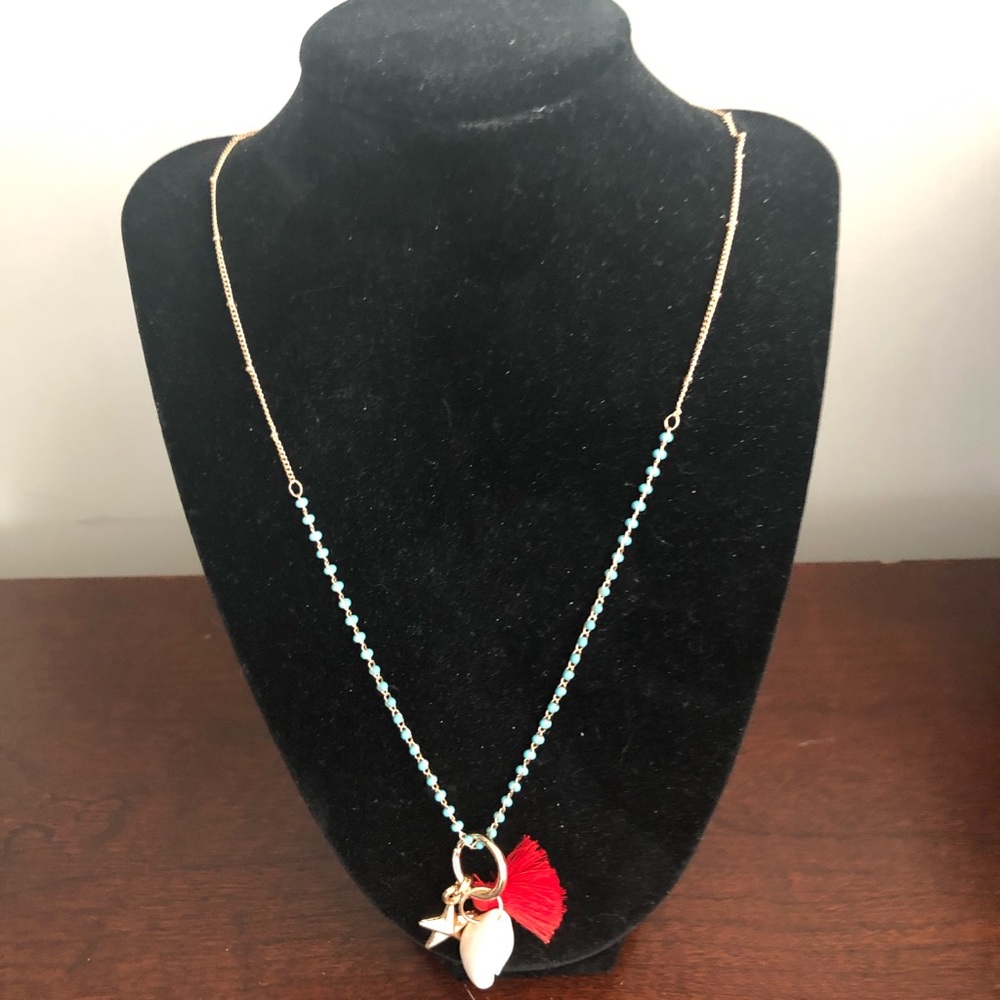 She’ll charm necklace from Beachly